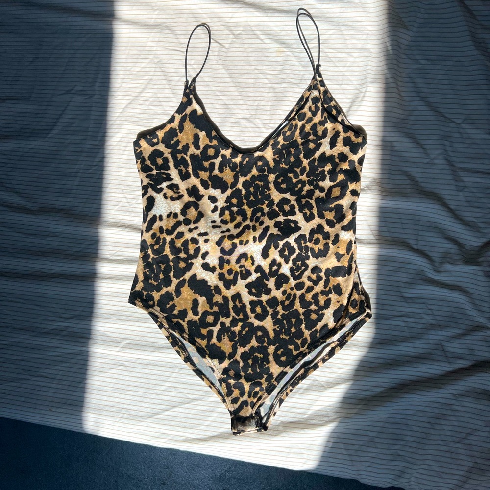 Cheetah print bodysuit. Size Medium